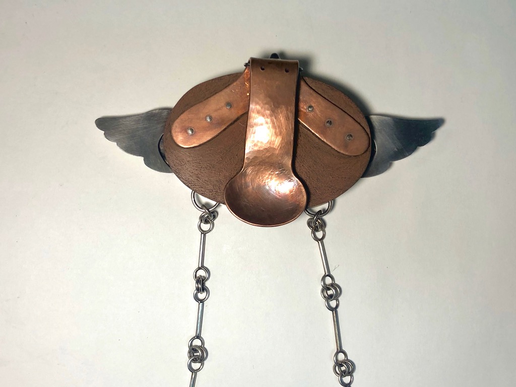 mdasilva_back-of-Traveler-1