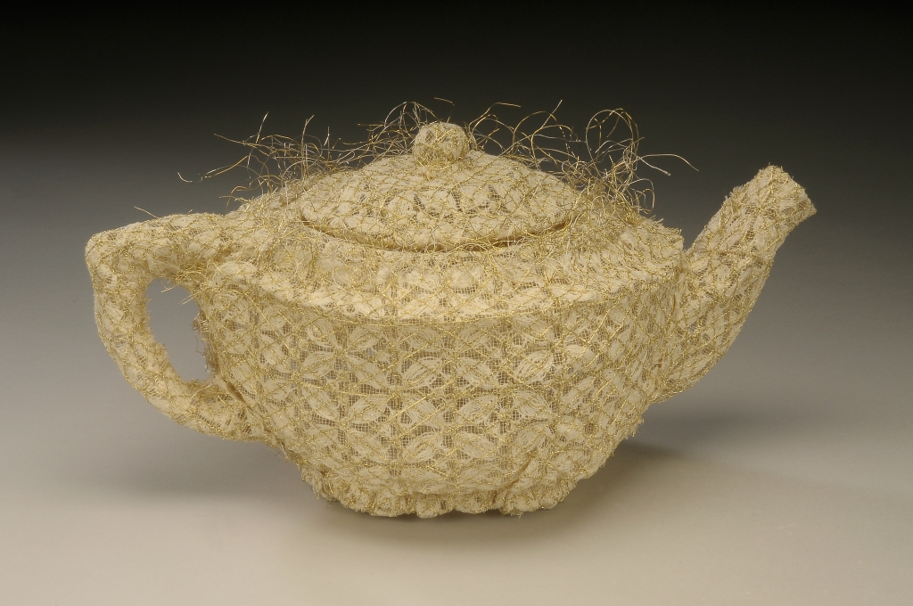 32-OvalGeometricLaceTeapot_SewnLaceWire_5x10.5x5.5.jpg