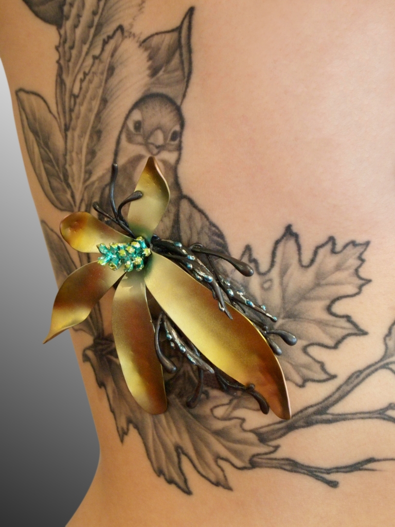 MarinJ_Brooch_DawnInsideTheJungle_Worn_Tattoo.JPG