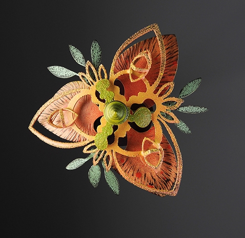 ThreadgillL_11-11_Rosette_Brooch_CopperBrassPolymer_2011.jpg