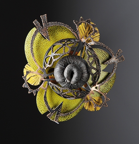 ThreadgillL_13-11_Rosette_Brooch_CopperBrassPolymer_2011.jpg